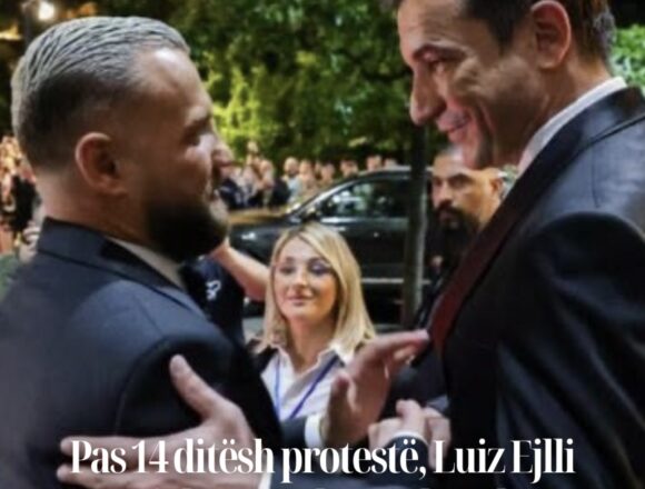 Pas 14 ditësh protestë, Luiz Ejlli “zgjohet” me këngë kundër pushtetit që dje i shtrëngonte dorën